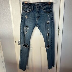 Hollister extremely distressed Skinny Epic Flex men’s blue denim